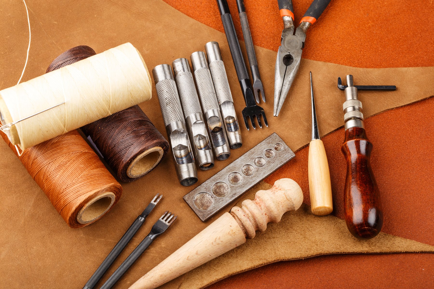 Closeup Photo of Leather Craft Tools